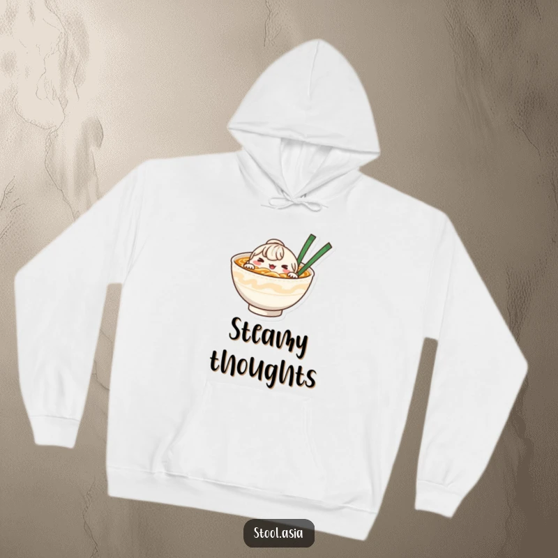 Funny whimsical noodle bowl character peeking from steaming broth, printed on a comfortable hoodie for foodies.